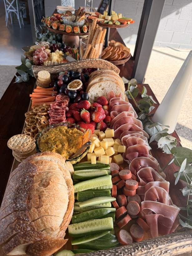 Close-up of bread, cucumber, prosciutto and berries