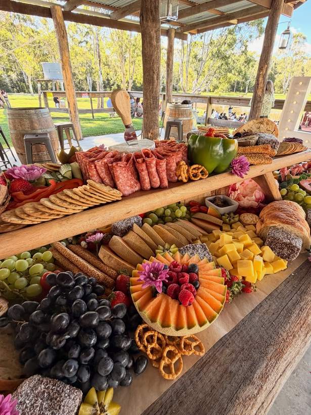 Grazing on timber boards under an outdoor pergola